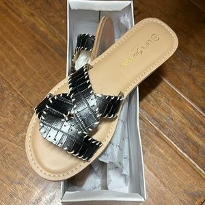 Black whipstitch sandals